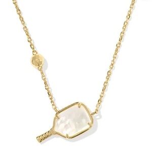 KENDRA SCOTT PICKLEBALL GOLD SHORT PENDANT NECKLACE IN IVORY MOTHER-OF-PEARL.
